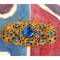 Filigree and blue glass bohemian vintage brooch