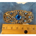 Filigree and blue glass bohemian vintage brooch