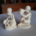 African bone carvings -  Bone?  Carved Zulu? Man drinking beer - Maiden pouring corn 8 cms tall