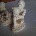 African bone carvings -  Bone?  Carved Zulu? Man drinking beer - Maiden pouring corn 8 cms tall