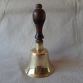 Brass School Bell - wooden handle.  Nice patina -15.5cms tall - original clapper