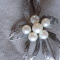 Stirling silver brooch with six 5 to 6 mm dia pearls   6.72 gms
