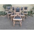 A 20th Century Set of Six of Carved Walnut Dining Chairs Upholstered in Leather and in a Contempo...