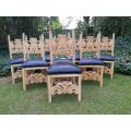 A 20th Century Set of Eight Carved and Bleached Oak Dining Chairs Upholstered in Leather