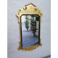 A 20TH Century Hand-Gilded Carved Wooden Mirror