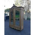 A 20th Century French Rococo Style Armoire with Bevelled Mirrors and Drawers finished in a contem...