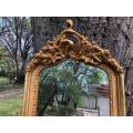 Ornately Carved and Gilded Bevelled Mirror