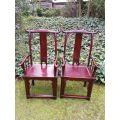 Pair of Chinese yoke-back armchairs