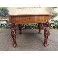An English Walnut and Rosewood Circular Table With An Inlaid Chess Board And Two Drawers. Circa 1...