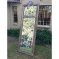 An Ornate Carved & Bevelled Painted Mirror