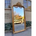 An Ornate Carved & Hand Gilded in Gold Leaf Mirror