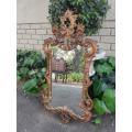 Gilt And Carved Wooden Mirror