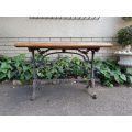 A Victorian Cast-Iron And Pine Table