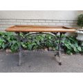 A Victorian Cast-Iron And Pine Table