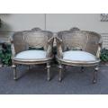 A Pair Of Gilded Rattan Arm/Bergere Style Chairs