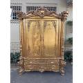 A 19th Century French Style Gold Painted Cabinet with Two Drawers