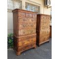 A NEAR PAIR of George III Burr walnut chest-on-chests