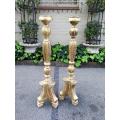 A Pair Of Carved Wooden Candle Holders Hand Gilded With Gold Leaf