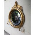 A 19th Century Regency Style Convex Giltwood Mirror