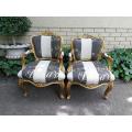 A Pair Of Carved And Gilded French Louis XV Chairs