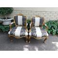 A Pair Of Carved And Gilded French Louis XV Chairs