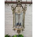 A Large Sized Brass And Engraved Glass Four Light Lantern