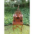 A 20th Century French Carved Mahogany and Walnut Victorian Cathedral Style Birdcage on Stand