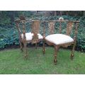 An Antique French-Style Carved Conversation Settee Hand-Gilded and Upholstered in a Custom-made S...