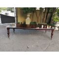 Victorian mahogany almost 3 meter twelve-seater extending dining table on castors
