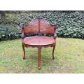 A French Walnut Carved And Rattan Chair