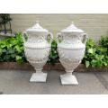 A Pair Of Concrete Urns With Handles And Lids