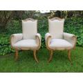 A Pair Of 1920s Bleached / Natural Carved Oak Armchairs upholstered