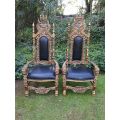 A Pair Of King / Throne Chairs Hand Gilded In Gold Leaf upholstered in Black Leather