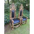 A Pair Of King / Throne Chairs Hand Gilded In Gold Leaf upholstered in Black Leather