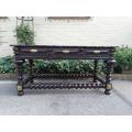 A 19th Century Portuguese Rosewood and Brass-mounted Writing Table With a Gilt-tooled Leather Wri...
