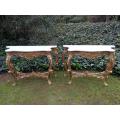 An Ornately Carved Pair or Marble Topped and Hand-gilded with Gold Leaf Console Tables