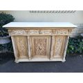 An Early 20th Century Bleached / Natural Wood Finish Walnut Carved Cabinet with A Cream Marble top