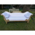A Regency Carved Bleached  / Natural Mahogany Settee on Castors