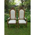 An Intricately Carved Pair of French Baroque/Rococo Style King/Throne Gold Painted Armchairs Upho...