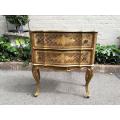 A Gilt-Wood Chest of Drawers ND