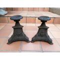 A Pair Of 20th Century French Cast Iron Candle Holders