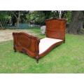 An Antique French Louis XV Carved Oak Bed