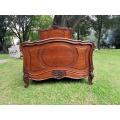 An Antique French Louis XV Carved Oak Bed