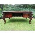 A 20th Century Large Carved Mahogany Desk