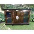 A French Style Ebonized Breakfront Credenza/Sideboard With Ormolu Mounts And Marquetry Inlay