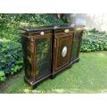A French Style Ebonized Breakfront Credenza/Sideboard With Ormolu Mounts And Marquetry Inlay