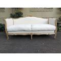 A Late 19th Century (Circa 1880) French Walnut Carved and Bleached Settee Upholstered in a French...