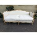 A Late 19th Century (Circa 1880) French Walnut Carved and Bleached Settee Upholstered in a French...