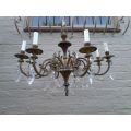 A 20th Century French Style Brass and Hand Gilded Crystal Chandelier