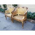 A 20th Century Pair or French Bergere Style Carved and Hand Gilded in Gold Leaf Wooden Chairs